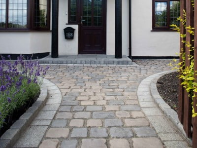 Derby Paving Contractors Laying Cobblestones in Derby